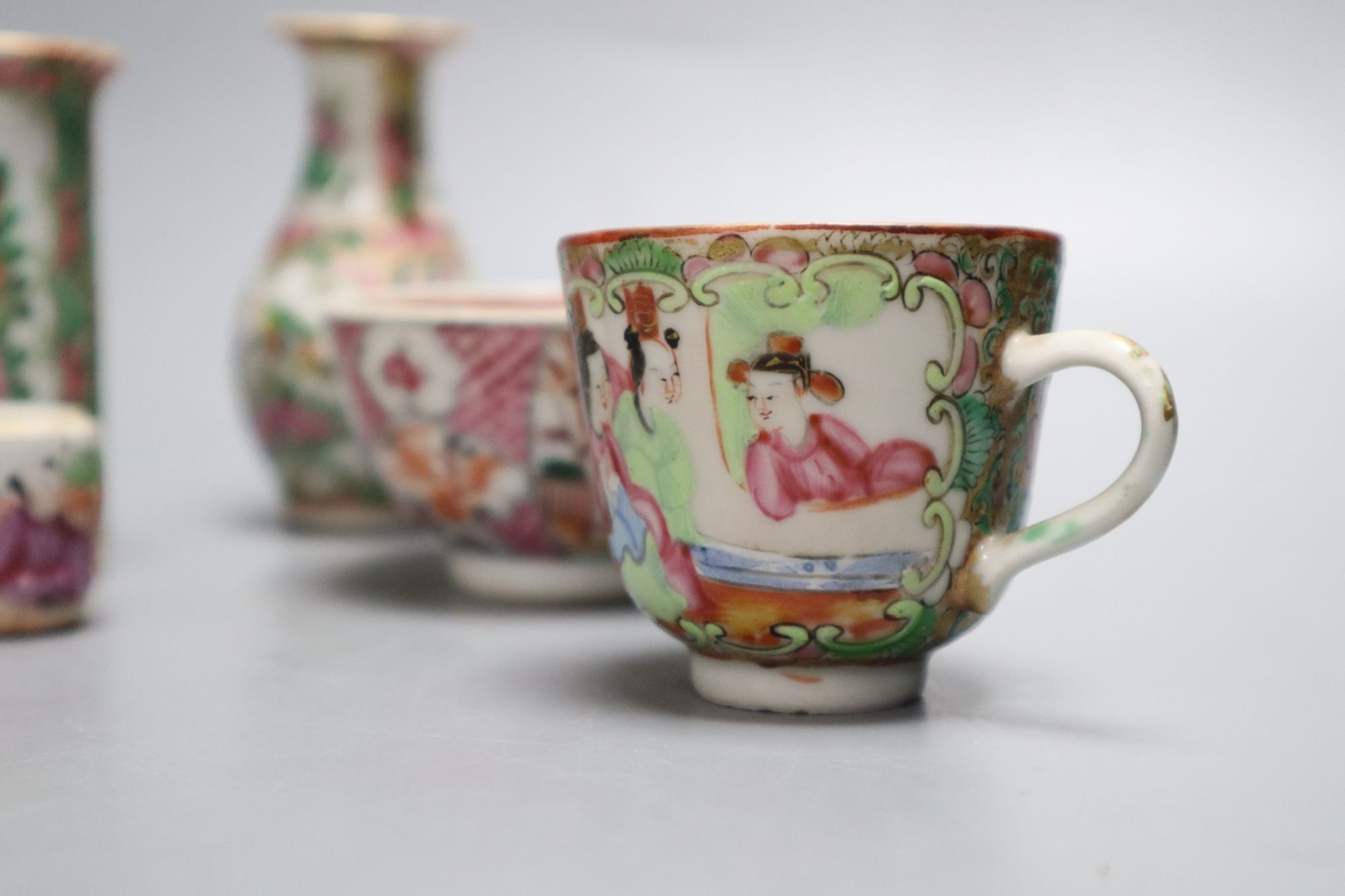 A group of Chinese famille rose tea wares and miniature vases, 19th century, tallest 9.5cm, damage